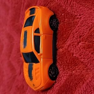 Kinsmart Plastic 1/64 Scale 2017 Chevrolet Camaro Red w/ black stripe.